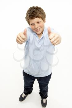 Royalty Free Photo of a Boy Giving Thumbs Up