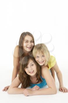 Royalty Free Photo of Three Girls on the Floor