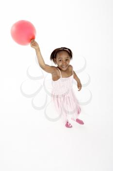 Royalty Free Photo of a Little Girl With a Balloon