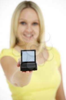 Royalty Free Photo of a Woman Holding a Model Computer