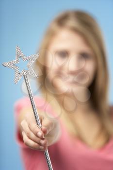 Royalty Free Photo of a Girl With a Fairy Wand