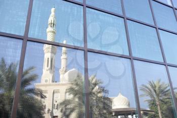 Royalty Free Photo of a Mosque Reflected in Office Windows