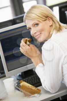Royalty Free Photo of a Woman Having Lunch