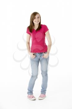 Royalty Free Photo of a Young Girl Standing With Her Fingers Hooked in Her Jeans