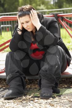 Royalty Free Photo of a Girl in a Playground