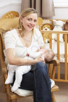 Royalty Free Photo of a Mother Breastfeeding