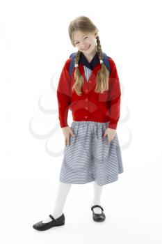 Studio Portrait of Smiling Girl Wearing School Bag