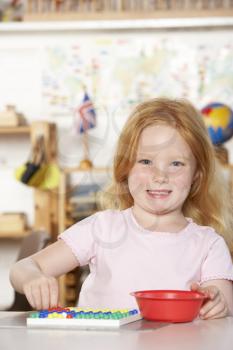 Royalty Free Photo of a Little Girl at Playschool