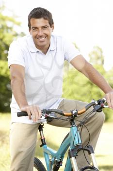 Royalty Free Photo of a Man Cycling