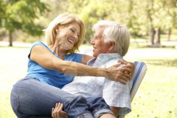 Royalty Free Photo of a Couple in a Garden