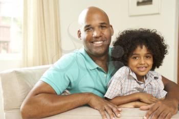 Royalty Free Photo of a Father and Son at Home
