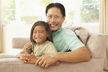 Royalty Free Photo of a Father and Son at Home