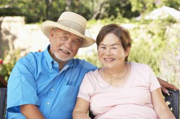 Royalty Free Photo of a Couple in a Garden