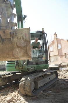 Construction Worker Using Digger