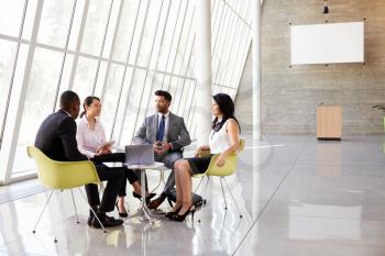 Group Business Meeting In Reception Of Modern Office