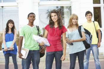 Group Of Teenage Students Standing Outside College Building