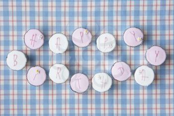 Cupcakes spell out happy birthday