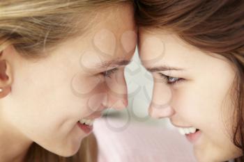 Close up portrait of teenage girls in profile