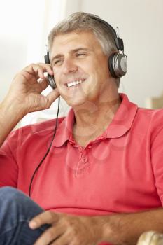 Mid age man wearing headphones