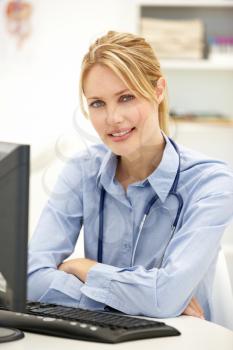 Young doctor at desk