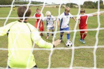 Player ready to score goal in Junior 5 a side