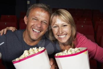 Couple Watching Film In Cinema