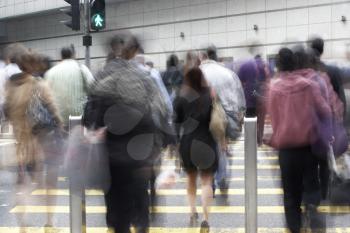 Commuters Crossing Busy Hong Kong Street