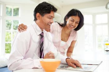 Man Having Breakfast Before Going To Work