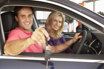 Couple buying new car