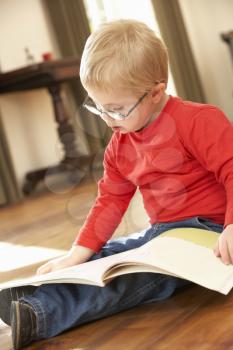 4 year old boy with Downs Syndrome reading