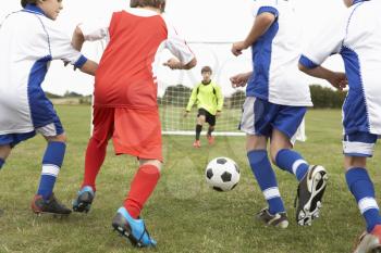 Junior 5 a side teams playing football