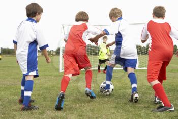 Junior 5 a side teams playing football