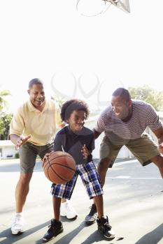 Grandfather With Son And Grandson Playing Basketball