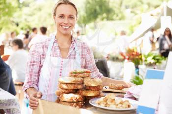 Woman Selling Fresh Sandwiches At Farmers Food Market