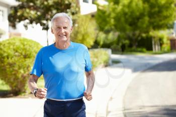 Elderly man jogging