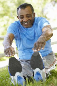 Senior African American Man Exercising In Park