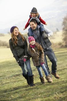 Family on country walk in winter
