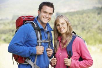 Portrait Of Couple On Hike In Beautiful Countryside