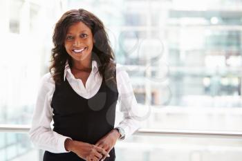 Mixed race businesswoman, waist up portrait