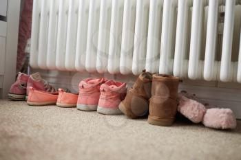 Shoes By Radiator In Family Home