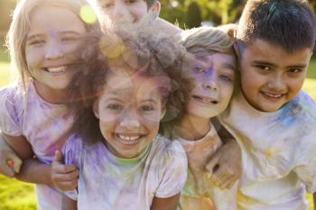 Portrait Of Children Celebrating Holi Festival