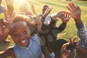 Elementary school kids outdoors, high angle, lens flare