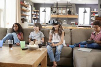 Children Play Computer Game Using Virtual Reality Headset