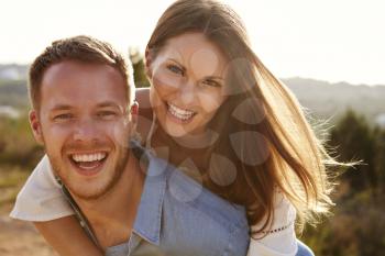 Portrait Of Young Couple Having Fun On Holiday Together