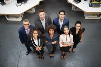 Overhead Portrait Of Business Team Standing In Modern Office