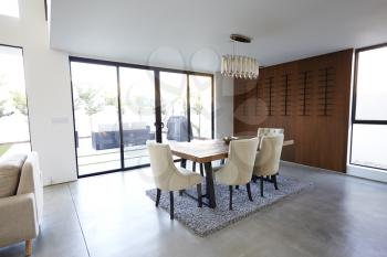Dining Table And Chairs In Stylish And Contemporary Empty Home