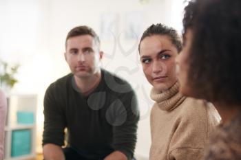 People Attending Support Group Meeting For Mental Health Or Dependency Issues In Community Space