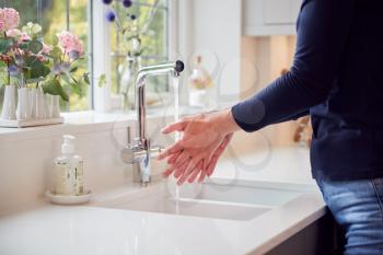 Close Up Of Woman Washing Hands With Soap At Home To Stop Spread Of Infection In Health Pandemic