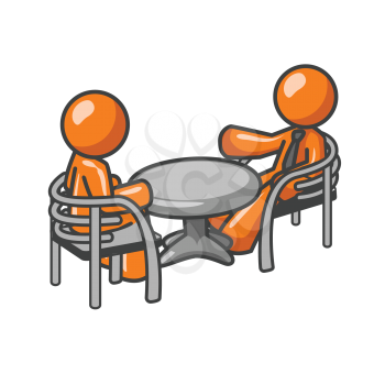 Two orange men at a table consulting over matters. 