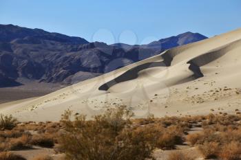   The Phenomenon of Death Valley, California - a huge sand dune Eureka morning sunrise. Delightful alternation of light and shade